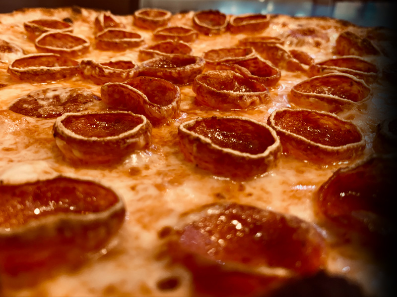 Spicy Slices Cupping Pepperoni Pizza